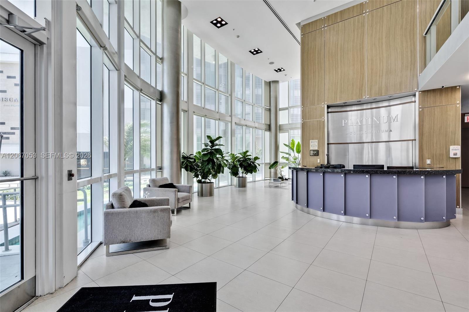 Double-height attended lobby at Platinum Condominium