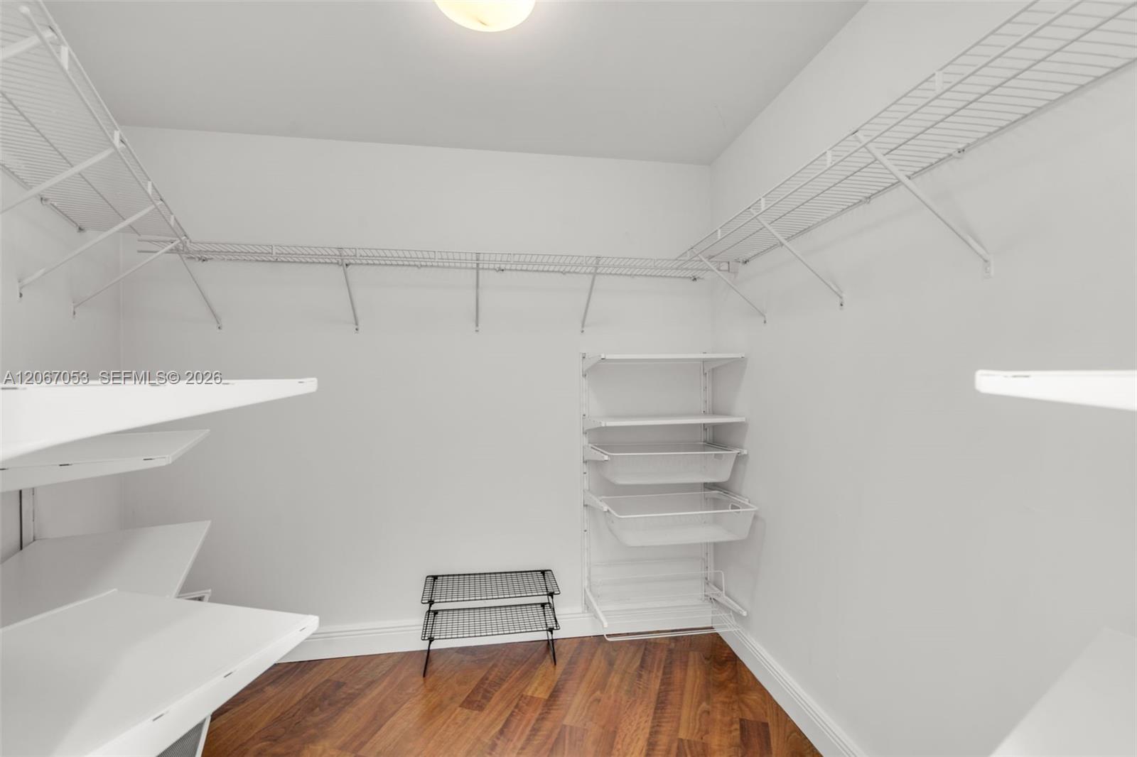 Walk-in closet with fitted shelving