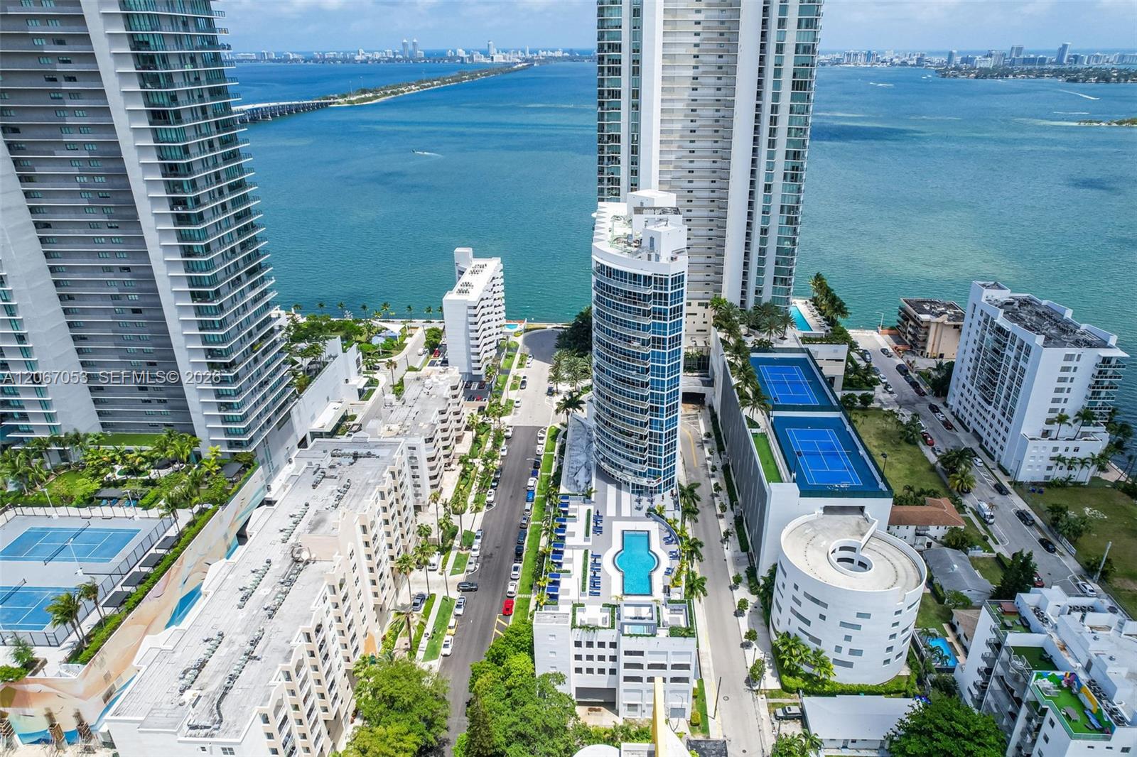 Aerial view of Platinum Condominium in Edgewater with Biscayne Bay and the Julia Tuttle Causeway