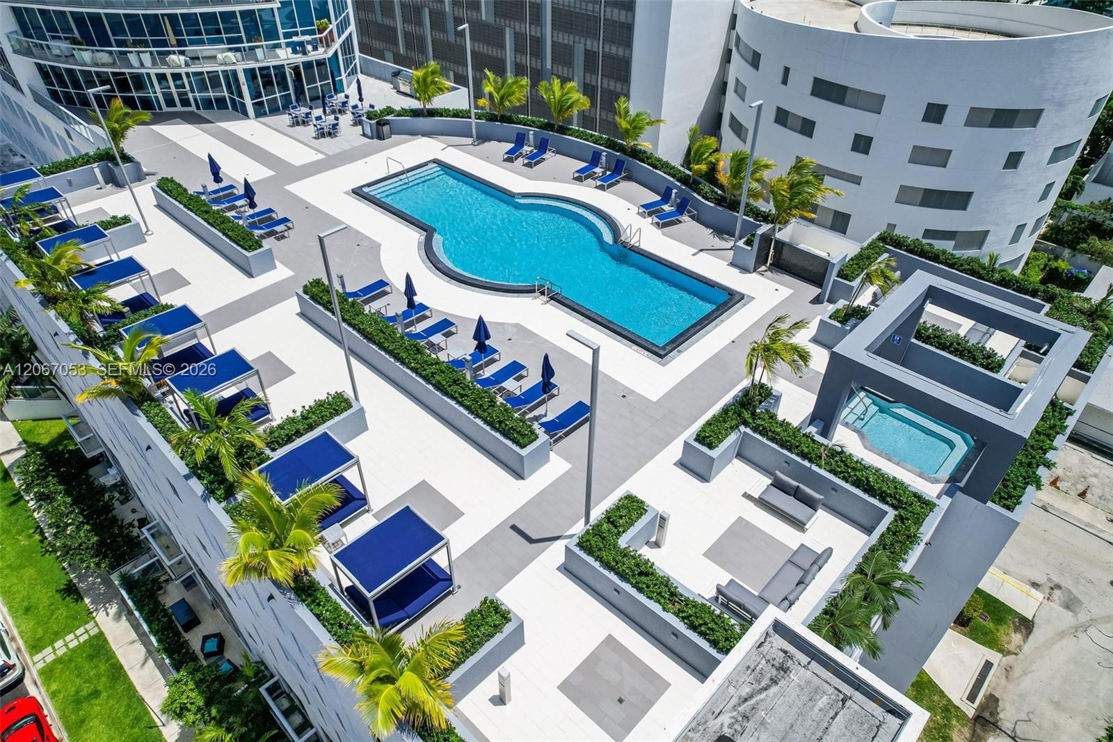 Heated pool and sundeck at Platinum Condominium