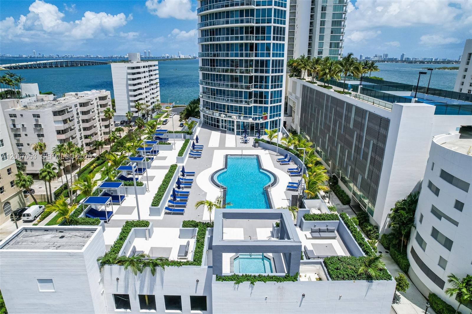 Aerial view of the pool deck with Biscayne Bay behind